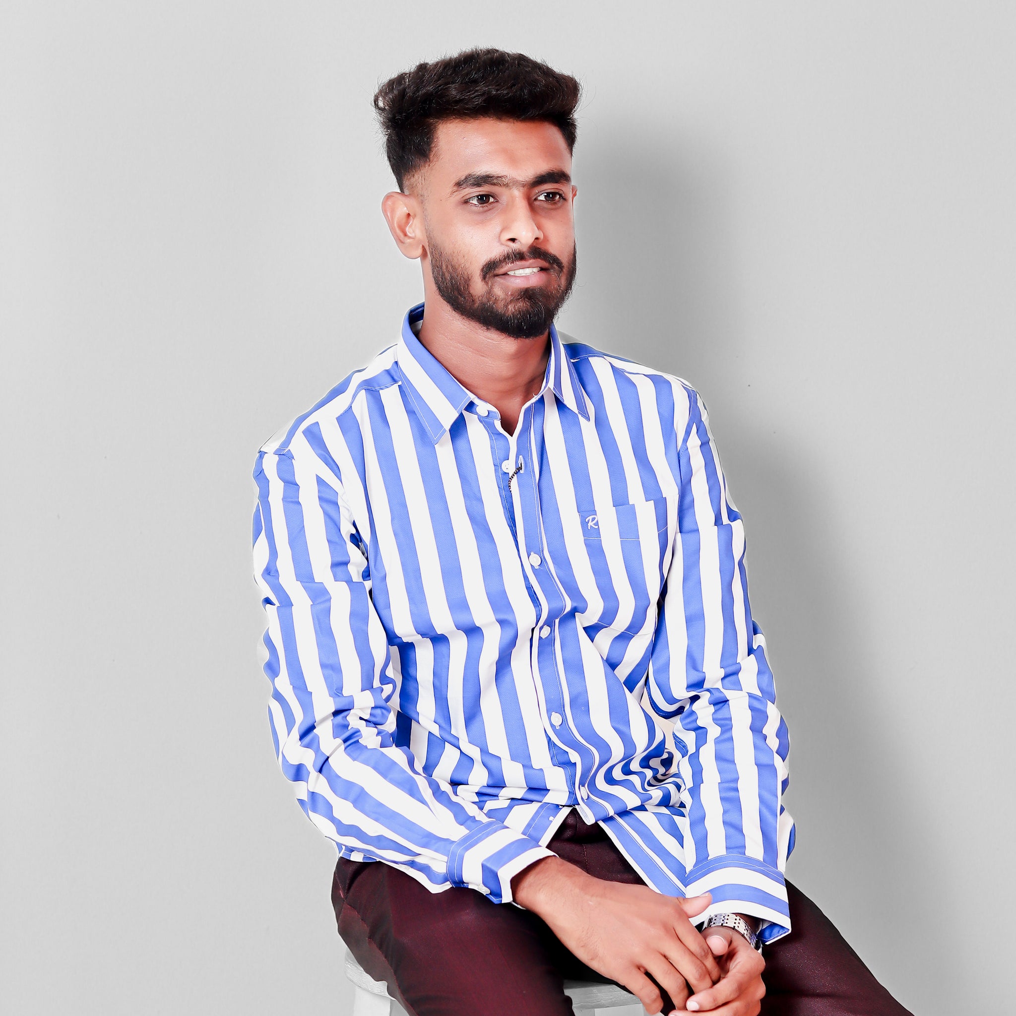 Blue and white stripe shirt.